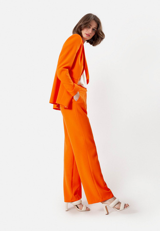 Pomarańczowe spodnie z szeroką nogawką