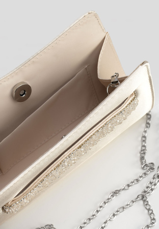 Elegancka torebka z ozdobną rączką w kolorze złotym