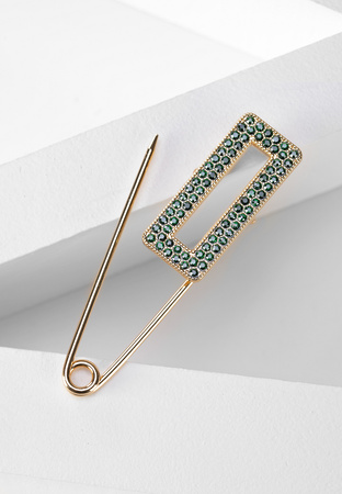 Złota agrafka zdobiona cyrkoniami