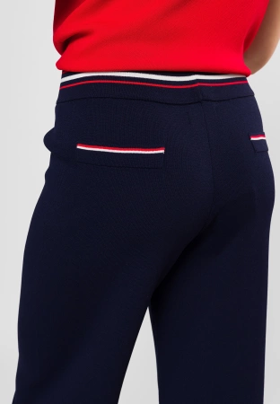 Granatowe spodnie z dzianiny z ozdobnym pasem i kieszonkami