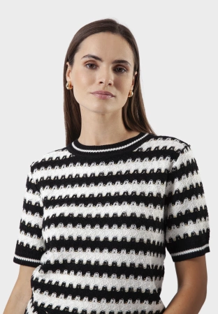 Dzianina w czarno-białe zygzaki ze złotą nitką