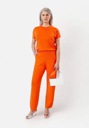 Pomarańczowe spodnie z dzianiny