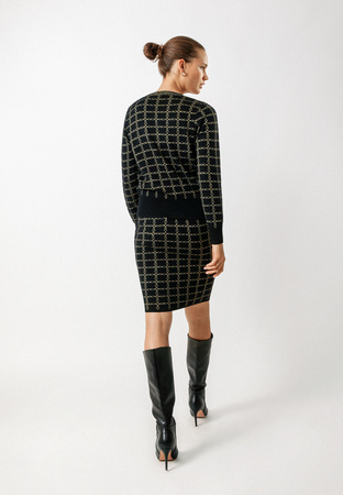 Czarna dzianinowa spódnica w złote łańcuchy