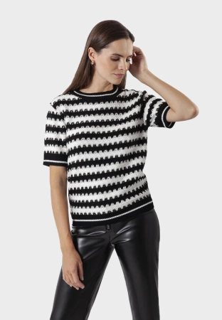 Dzianina w czarno-białe zygzaki ze złotą nitką
