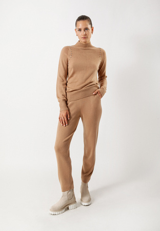 Beżowe dzianinowe spodnie z kieszeniami