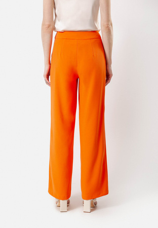 Pomarańczowe spodnie z szeroką nogawką