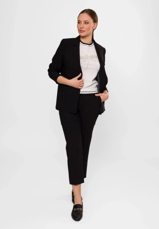 Dzianinowa ecru bluzka z aplikacją