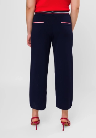 Granatowe spodnie z dzianiny z ozdobnym pasem i kieszonkami