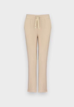 Bawełniane dresowe spodnie w beżowym kolorze