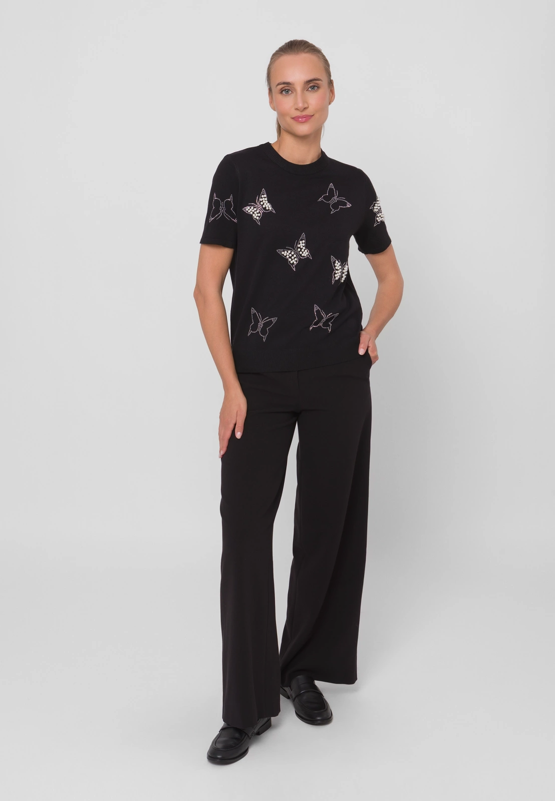 Czarna dzianinowa bluzka z motywem motyli
