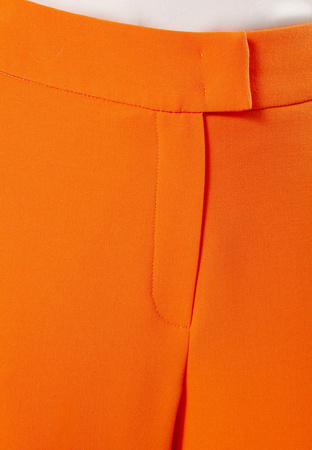 Pomarańczowe spodnie z szeroką nogawką