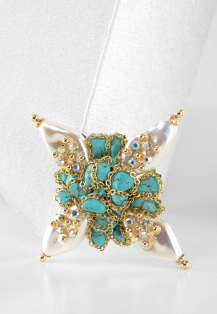 Broszka w kształcie gwiazdy z turkusem