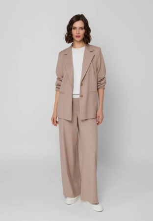 Beżowe spodnie z szeroką nogawką