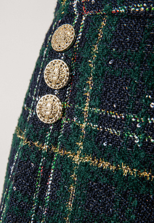 Zielona spódnica w kratę ozdobiona cekinami