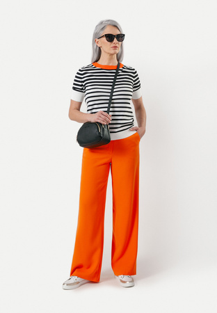 Pomarańczowe spodnie z szeroką nogawką
