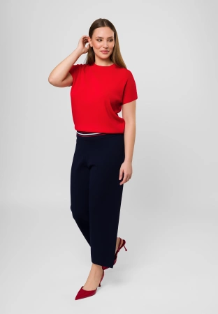 Granatowe spodnie z dzianiny z ozdobnym pasem i kieszonkami