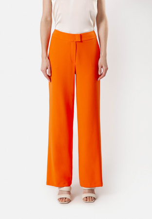 Pomarańczowe spodnie z szeroką nogawką