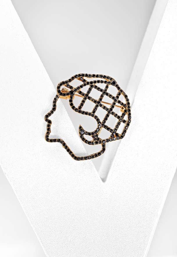 Broszka w kształcie kobiecej głowy