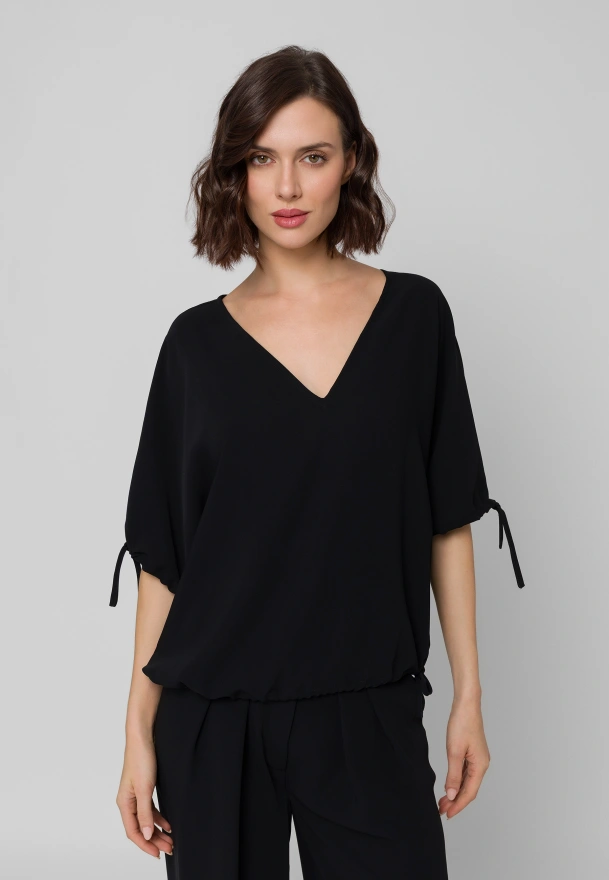Czarna bluzka oversize ze ściągaczami