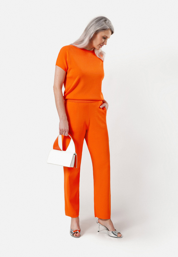 Pomarańczowe spodnie z dzianiny