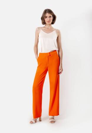 Pomarańczowe spodnie z szeroką nogawką